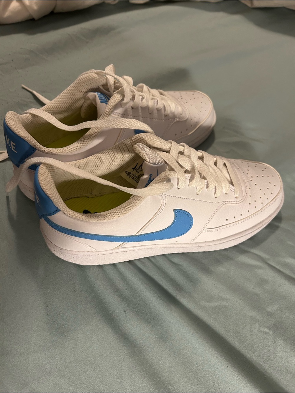 Nike Women’s White Sneakers with Light Blue Swoosh